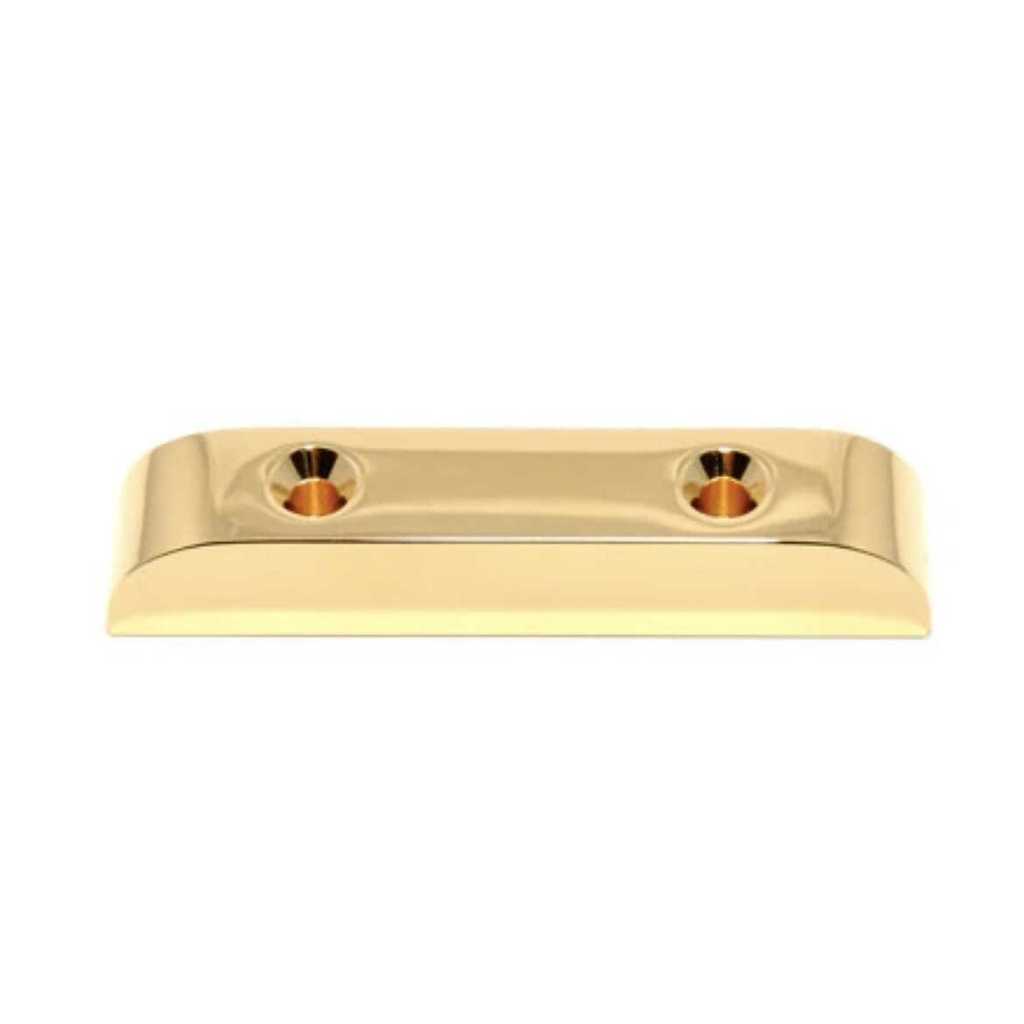 Gold metal bracket on a white background