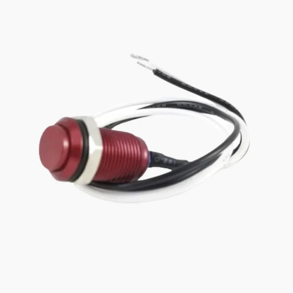 Red button with a cable on a white background