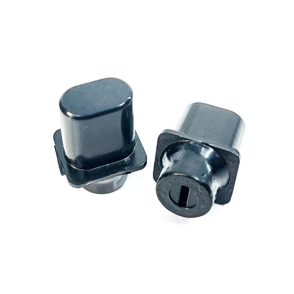 Two metallic knobs on a white background