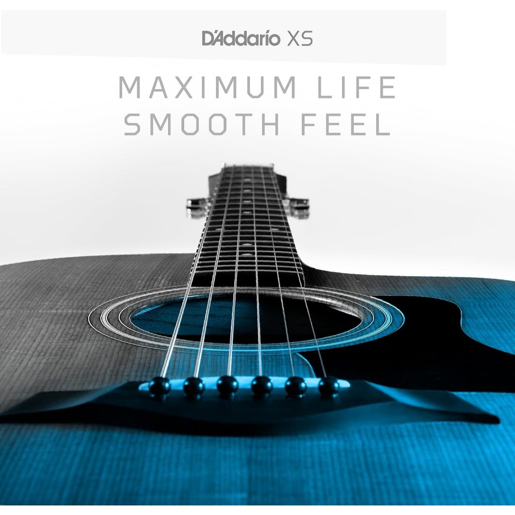 Acoustic guitar with D'Addario XS branding on a white background