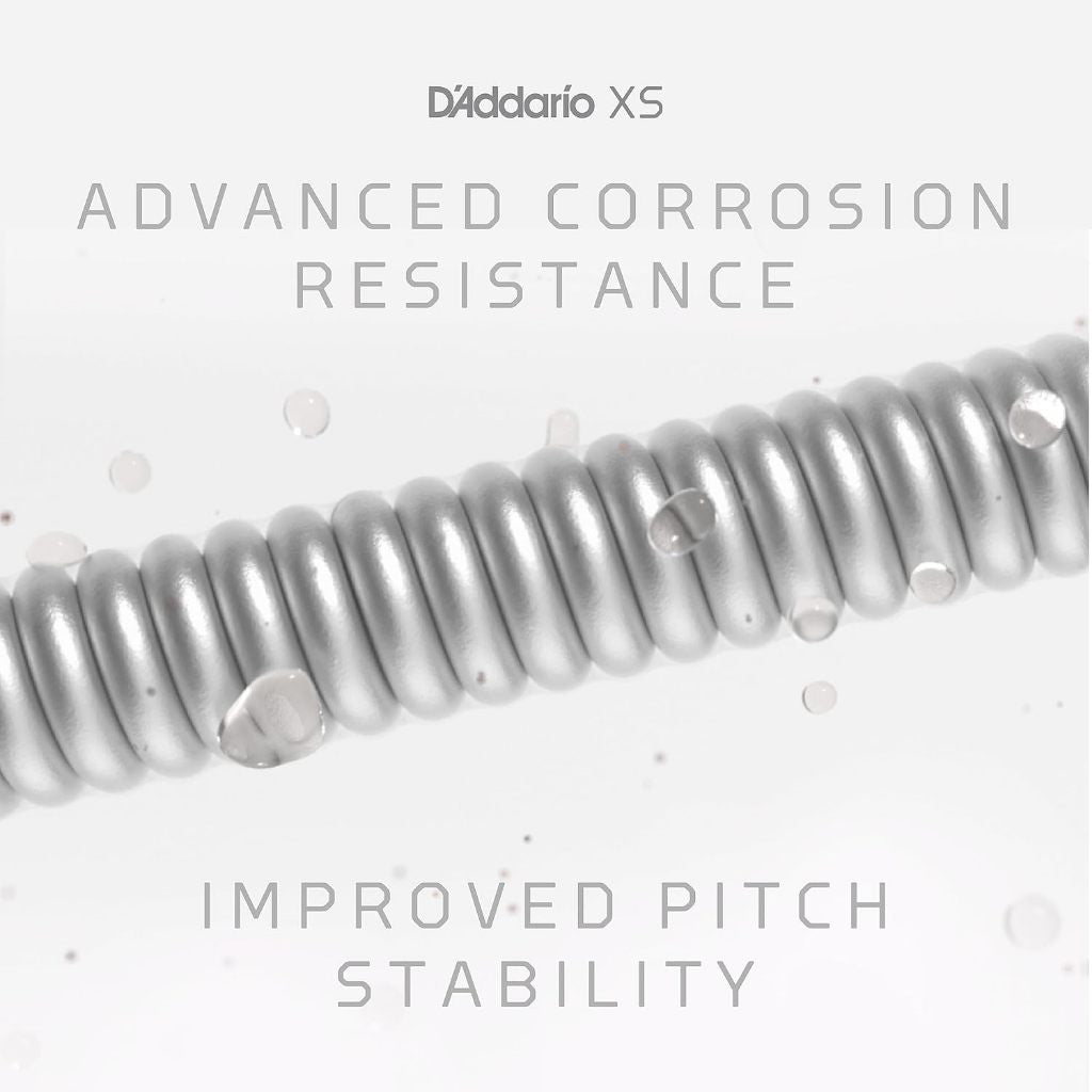 D'Addario XS guitar string with text on advanced corrosion resistance and improved pitch stability.