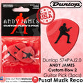 Packaging of Dunlop 574PAJ200 Andy James Custom Flow 2 Signature Guitar Picks. The package contains three red guitar picks with a silhouette of a guitarist on them, against a white background with a 'Made in USA' label.