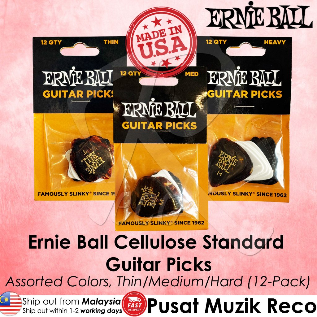 Three packages of Ernie Ball Cellulose Standard Guitar Picks in Thin, Medium, and Heavy sizes, shown in assorted black, white, and brown colors. The image features a pink background with text overlays detailing the product, including 'Assorted Colors, Thin/Medium/Hard (12-Pack)' and a 'Made in U.
