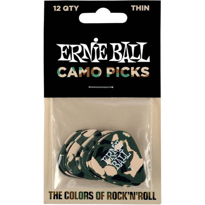 Ernie Ball Camo Picks in a clear plastic blister pack with a black cardboard header. The picks have a green and beige camouflage pattern with the 'Ernie Ball' logo printed on them.