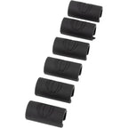 Six black rubber handlebar grips arranged diagonally on a plain white background.