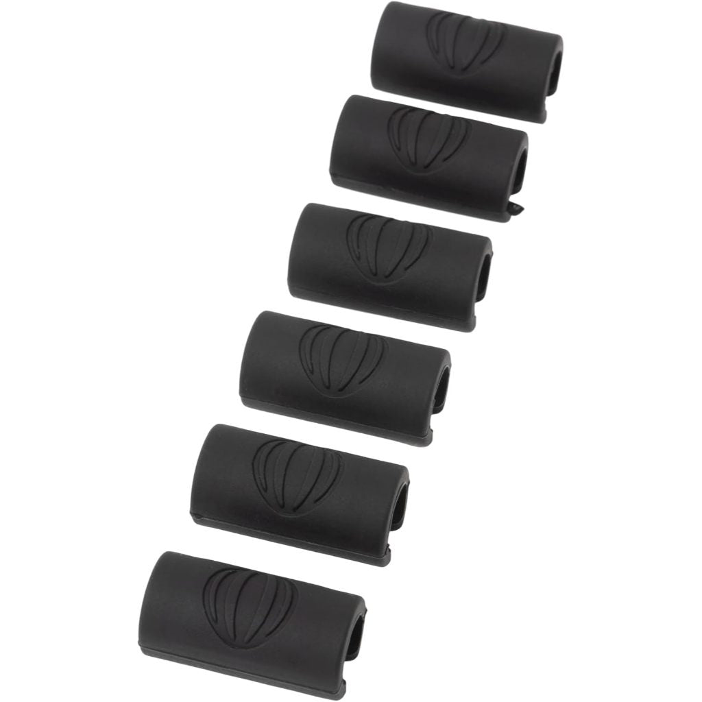 Six black rubber handlebar grips arranged diagonally on a plain white background.