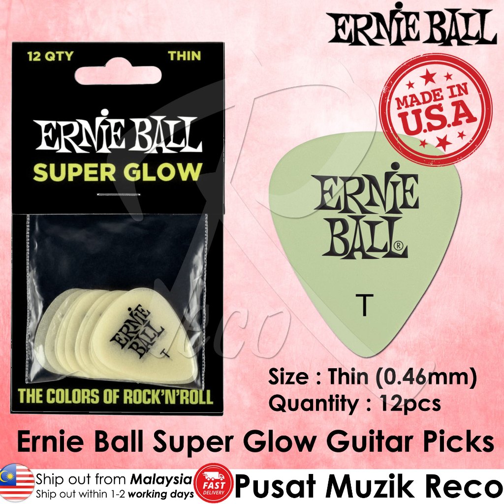 Ernie Ball Super Glow Thin guitar picks in a 12-pack, shown in their black retail packaging alongside a single pale green pick displaying the Ernie Ball logo. The image includes a 'Made in USA' stamp and product specifications.