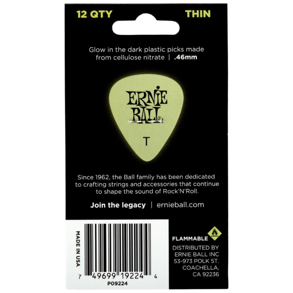 Ernie Ball Thin glow-in-the-dark cellulose nitrate guitar picks on black retail backing card, showing a single pale yellow-green pick with the Ernie Ball logo.