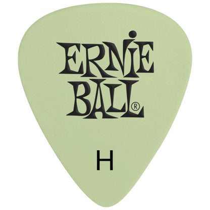 A single Ernie Ball H-shaped guitar pick in a light sage green color with black printed brand lettering and an 'H' size indicator, shown on a plain white background.