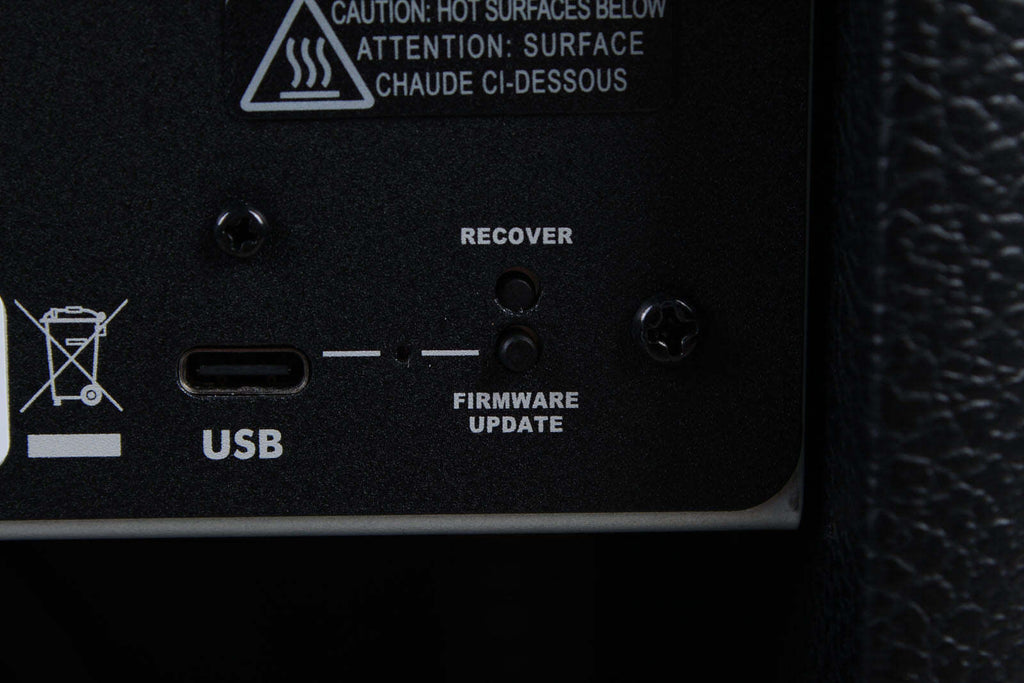 Back panel of electronic device with USB and recovery ports