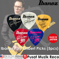 Ibanez guitar picks with a man holding a guitar, featuring the Ibanez brand.