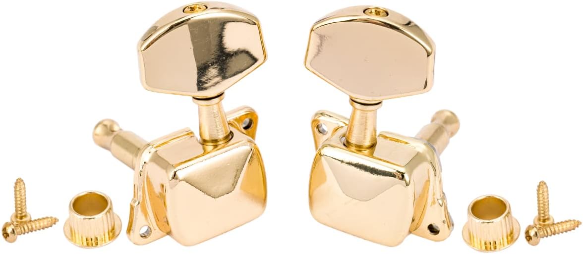 Set of gold guitar tuners with screws on a white background