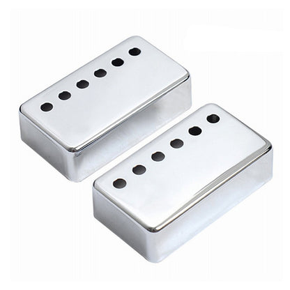 Two silver chrome guitar humbucker pickups with five black pole pieces, shown on a plain white background.