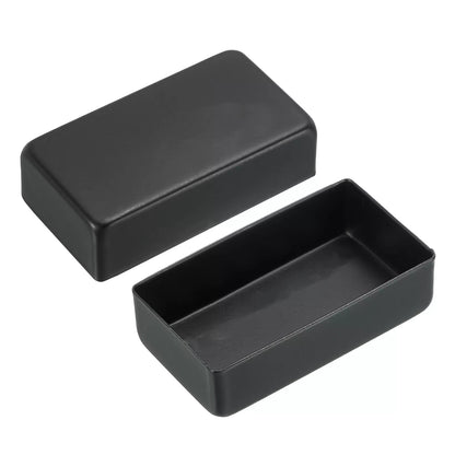 A black rectangular plastic container with its lid off, displayed on a clean white background.