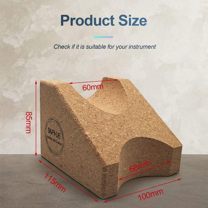 Cork block with dimensions labeled on a gray surface