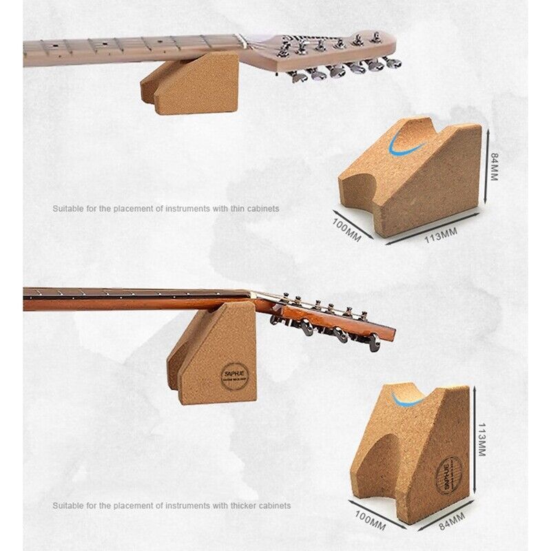 Cork guitar stand shown with two guitar headstocks demonstrating use, plus three dimension callouts for different instrument widths. The image is not a plain product hero shot because the main purpose is to communicate size suitability, so subject_type is Measurement Chart.