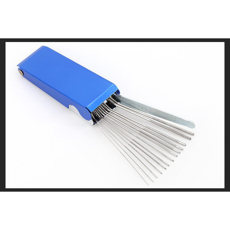 A blue metal lock pick set with multiple slim silver picks and a silver tension wrench, displayed in an open holder on a white background.