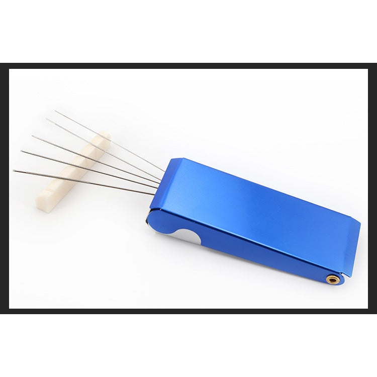 A blue metal pocket organizer with several thin metal pins or wires attached, shown on a white background with a black border.