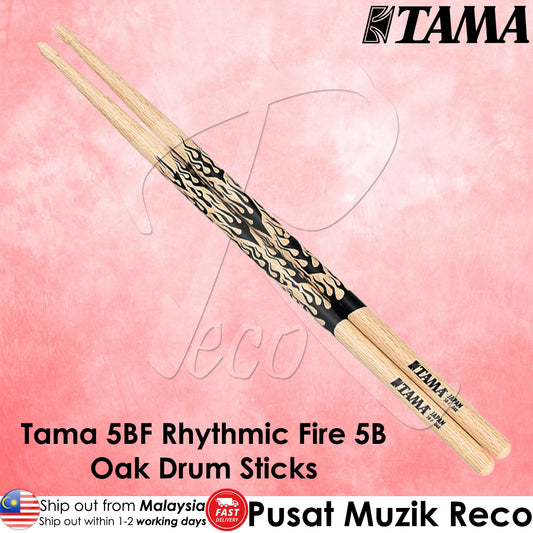 Tama 5BF Rhythmic Fire 5B Oak Drum Sticks on a pink background with Tama logo.