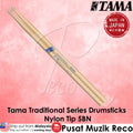 Tama Traditional Series drumsticks with nylon tip on a pink background, featuring Tama logo and 'Made in Japan' badge.