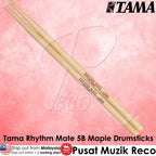 A pair of Tama Rhythm Mate 5B maple drumsticks shown diagonally on a pink textured background with Tama branding and product text overlays.