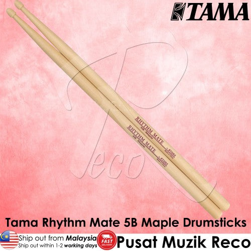 A pair of Tama Rhythm Mate 5B maple drumsticks shown diagonally on a pink textured background with Tama branding and product text overlays.