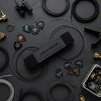 Gruv Gear FretWrap flat lay with guitar picks and strings – top-down lifestyle shot